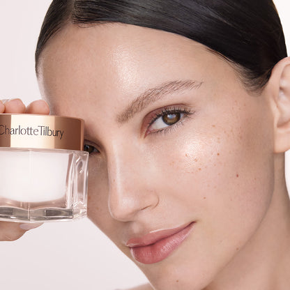 Model holding Magic Cream