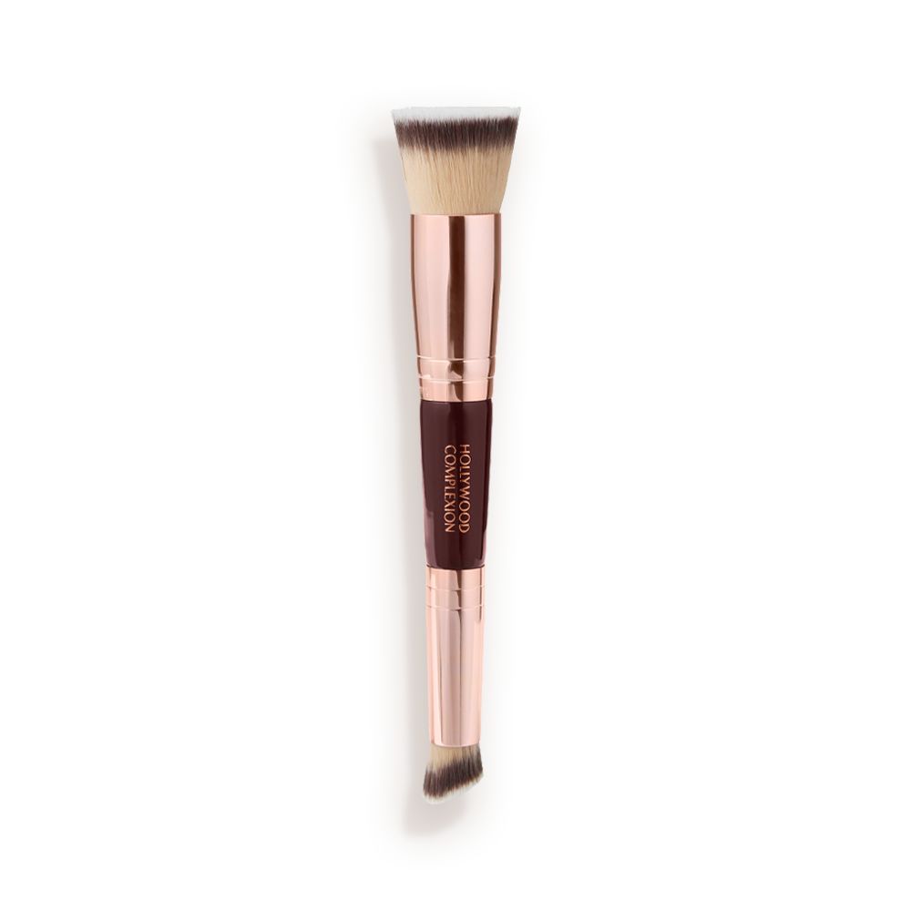 A double-ended contour brush with soft bristles and rose gold and dark crimson handle.