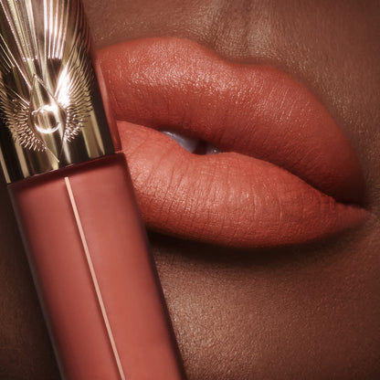 Airbrush Flawless Lip Blur in Honey close up on a deep skin tone model