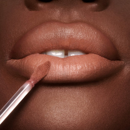 Airbrush Flawless Lip Blur in Nude close up on a deep skin tone model