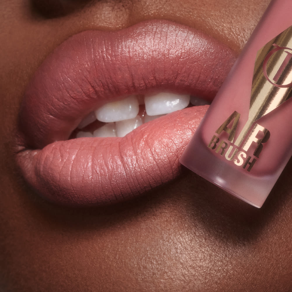 PillowTalk Airbrush Lip Blur close up on a deep skin tone model