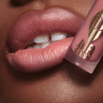 PillowTalk Airbrush Lip Blur close up on a deep skin tone model