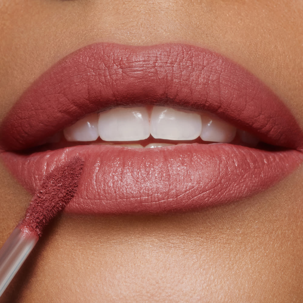 Pillow Talk Medium Airbrush Lip Blur close up on a medium skin tone model