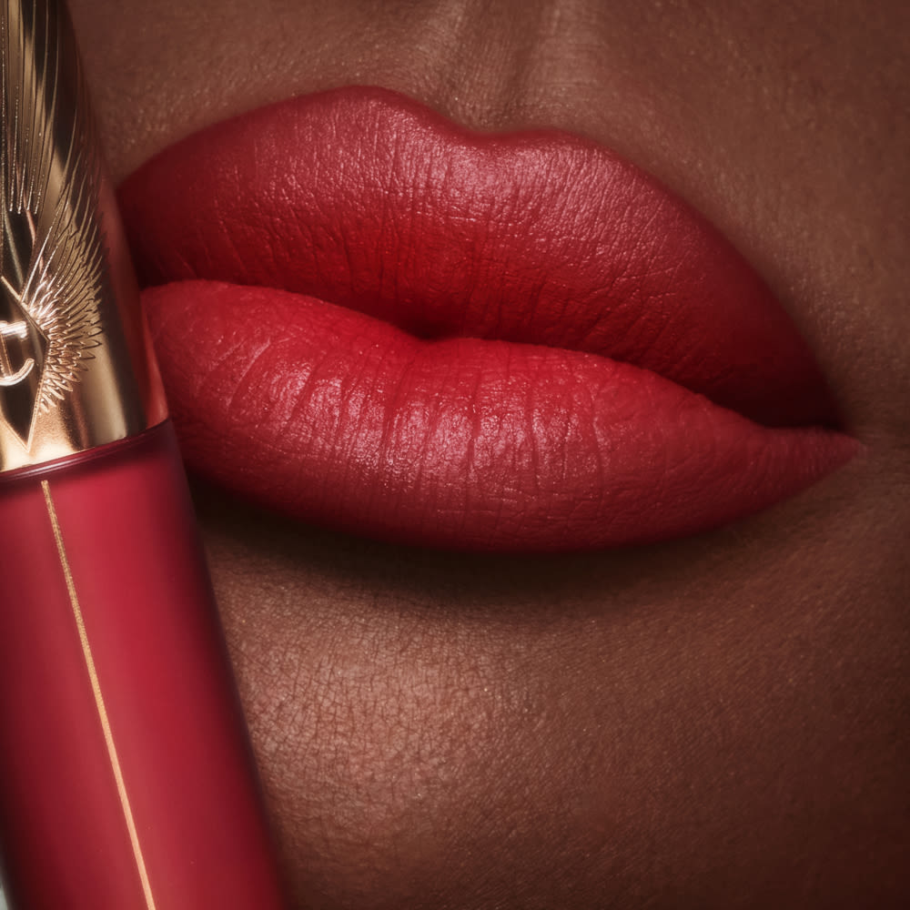 Ruby Airbrush Lip blur close up on a deep skin tone model