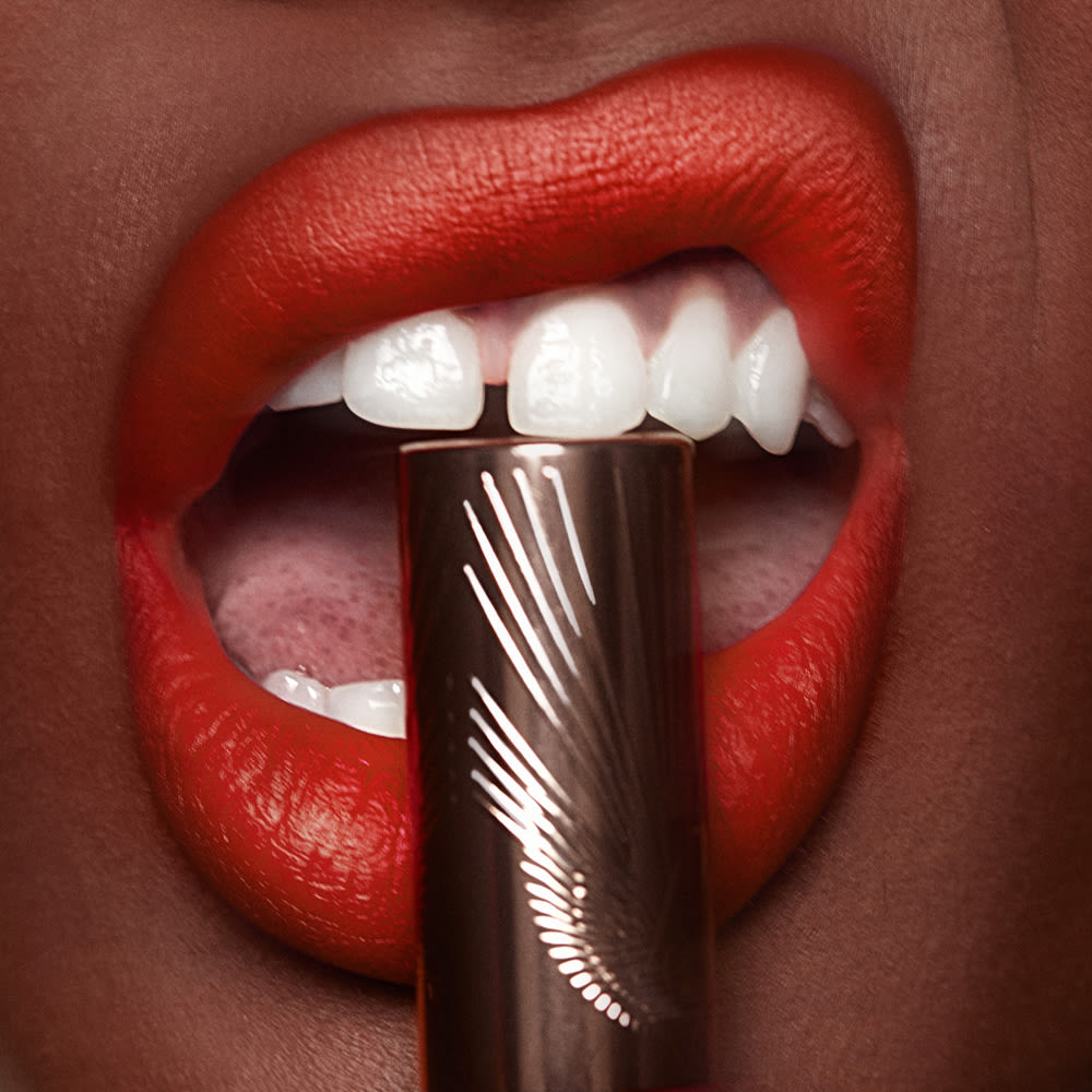 Flame Airbrush Lip Blur close up on a deep skin tone model