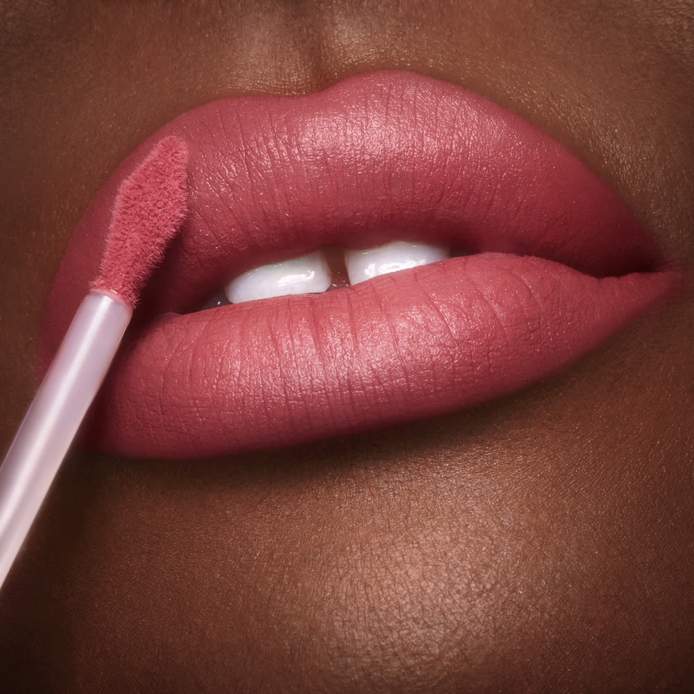 Rose Airbrush Lip Blur close up on a deep skin tone model