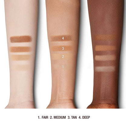 Deep, tan, and fair-tone arms with swatches of pressed powder in light, medium, tan, and deep.