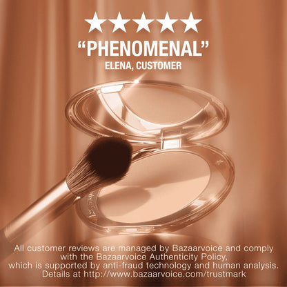 A collection of pressed powder compacts for light, medium-light, fair, and deep tones, in gold-coloured packaging with mirrored lids.