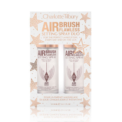 Two, identical, mini setting sprays in a white and gold-coloured packaging box with gold stars printed all over with text on the box that reads, 'Charlotte Tilbury. Airbrush Flawless Setting Spray duo'