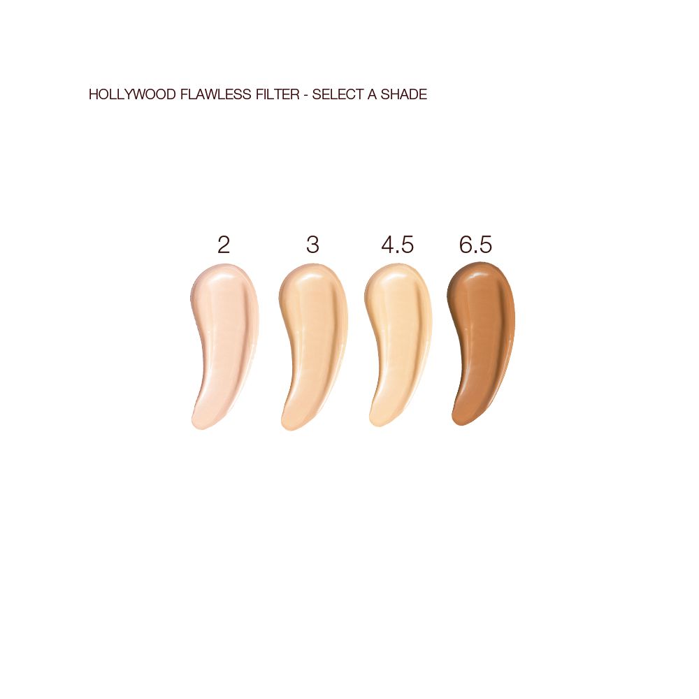 Swatches of four, glowy primers in nude peach, light golden-beige, yellow-beige, and dark brown.