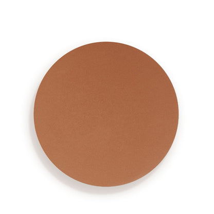 Swatch of a finely-milled bronzer in a chocolate brown shade, which is perfect for tan tones.