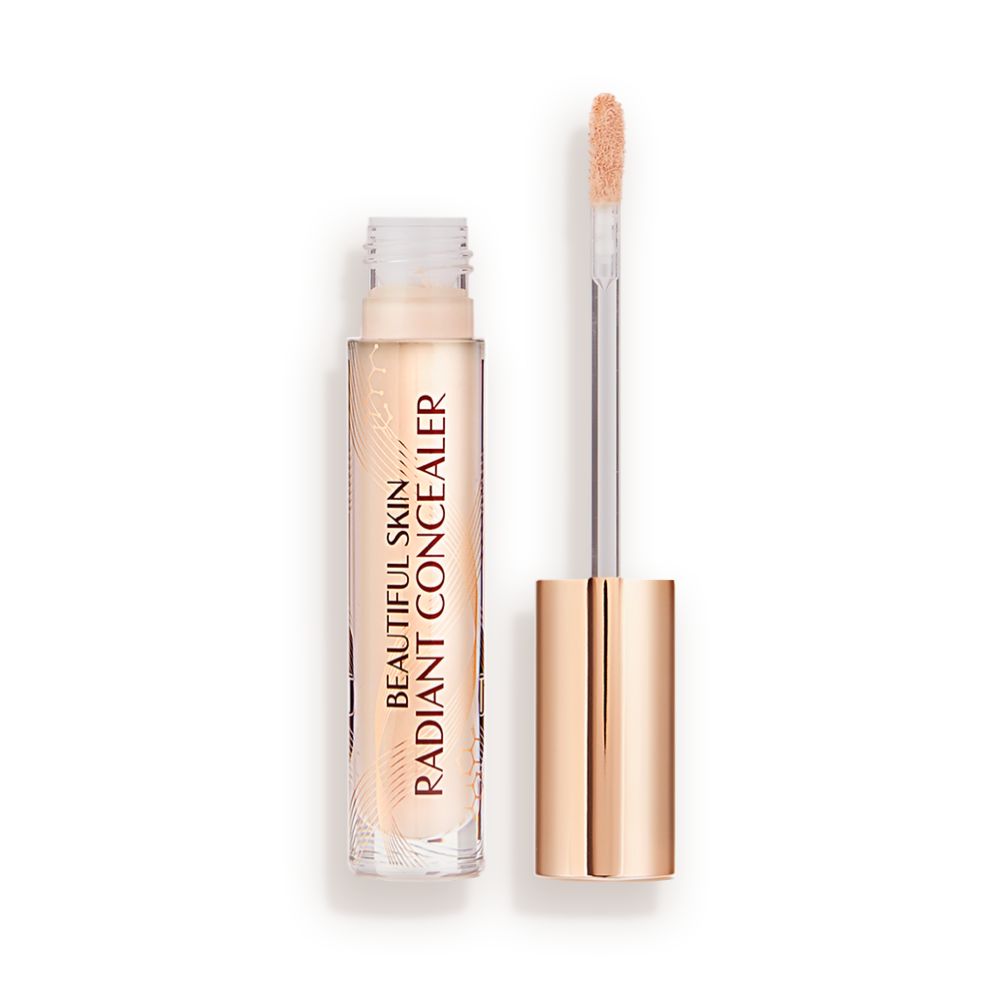 Radiant concealer in a glass tube with a gold-coloured lid with text on the tube that reads, 'Beautiful Skin Concealer'