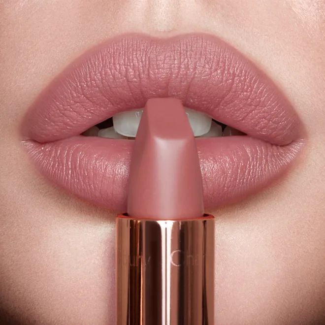 Model wearing Pillow Talk lip liner and lipstick combination