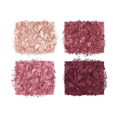 Swatches of crushed eyeshadows in shades of pink, plum, and champagne.
