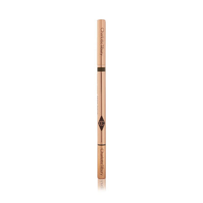 A closed, double-ended eyebrow pencil and spoolie brush duo with gold-coloured packaging.