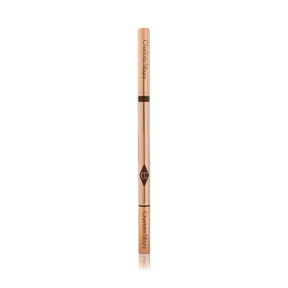 A closed, double-ended eyebrow pencil and spoolie brush duo with gold-coloured packaging.