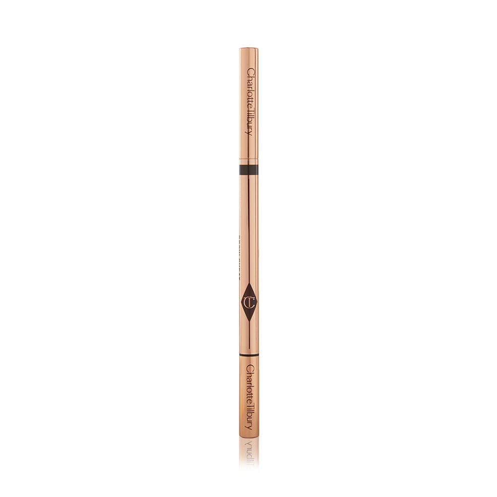A closed, double-ended eyebrow pencil and spoolie brush duo with gold-coloured packaging.