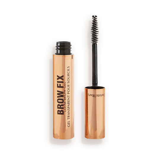 An open tube of clear, brow fixing gel with gold-coloured packaging.