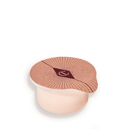 Refill of a champagne-coloured, thick and luscious eye cream in a petite pot with an easy-to-peel-off cover.