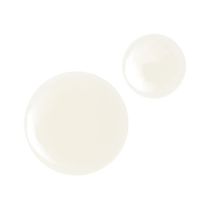 Swatches of a glowy, ivory-coloured lip oil.