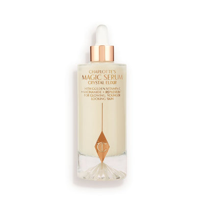 A luminous, ivory-coloured facial serum in a glass bottle with a white and gold-coloured dropper lid