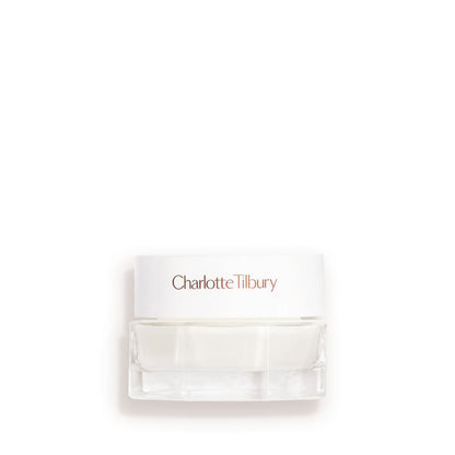 Mini clear jar with a white lid and white cream inside.
