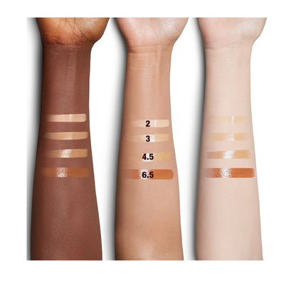 Fair, medium, and deep-tone arm swatches of four glow-boosting primer in light, medium-light, medium-dark, and deep shades.