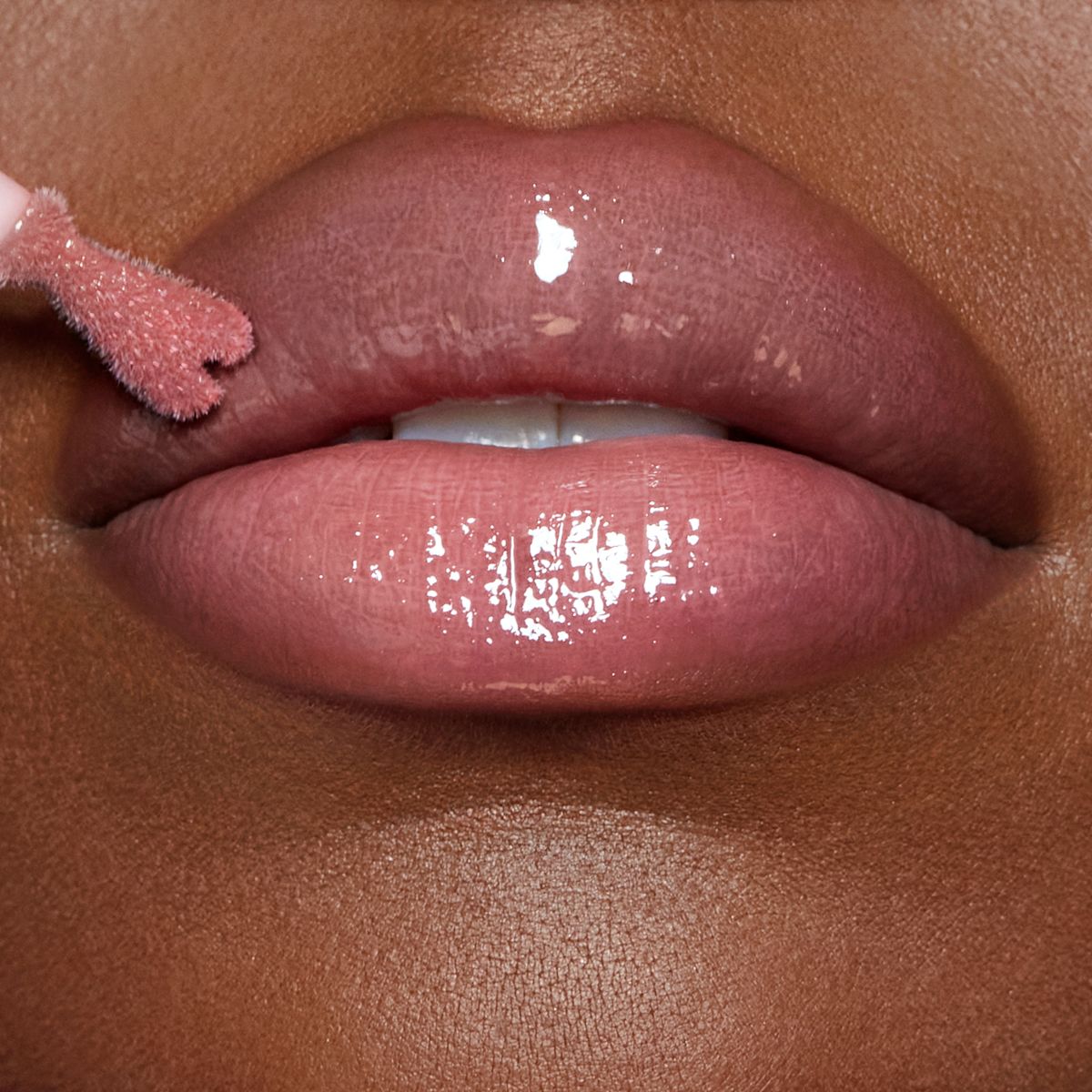 Collagen Lip Bath - Pillow Talk Fair on deep skin tone model