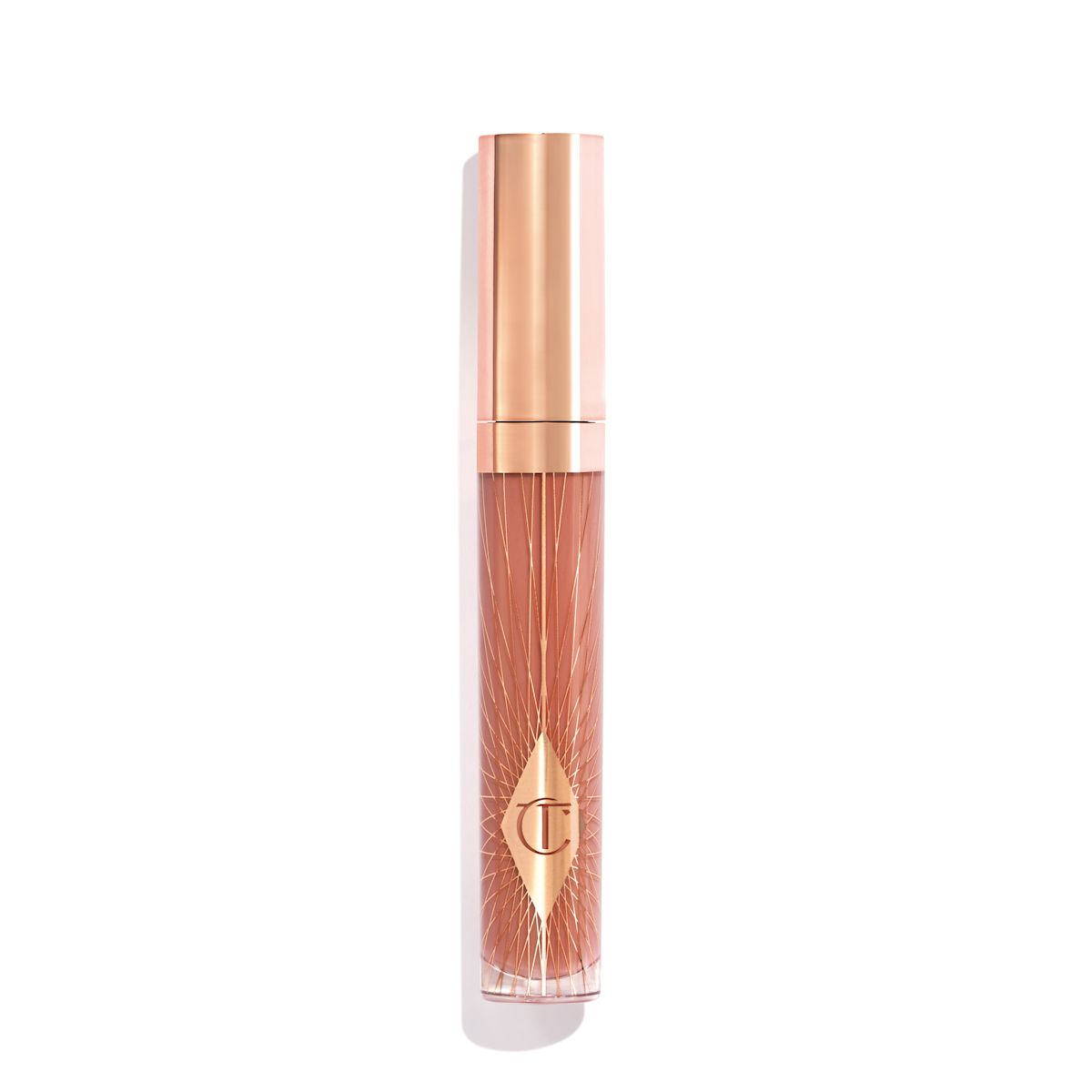 Closed, standard-sized nude-pink lip gloss with a CT symbol on the tube and a rose gold lid.
