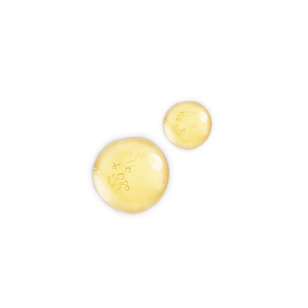 Two drops of a light-gold-coloured facial oil.