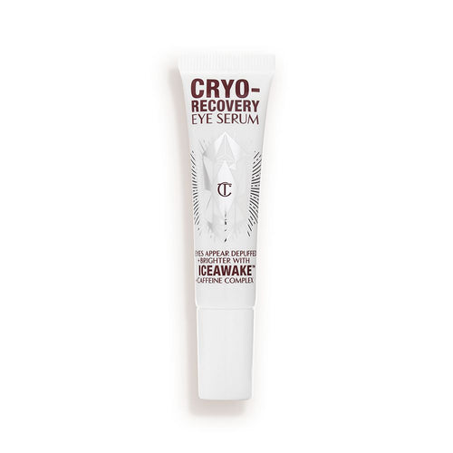 An open, white-coloured eye serum tube with silver-colour geometric patterns on the front and text written on it that reads, 'eye appear depuffed and brighter with Iceawake, caffeine complex'