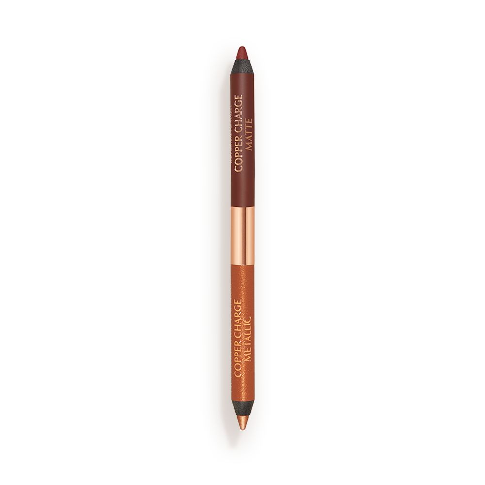 An open, double-ended eyeliner pen in warm rust and copper colours.