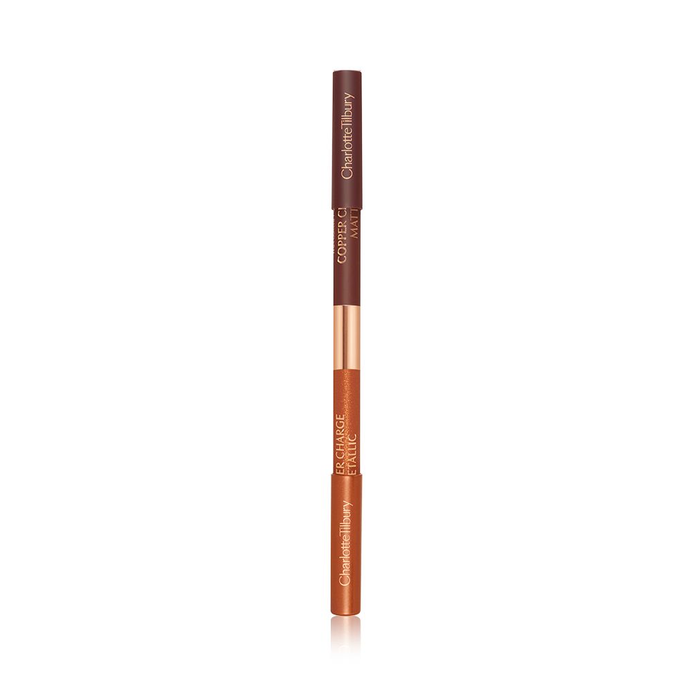 A closed, double-sided eyeliner pen with half of the outside a copper colour and the other half a warm rust.