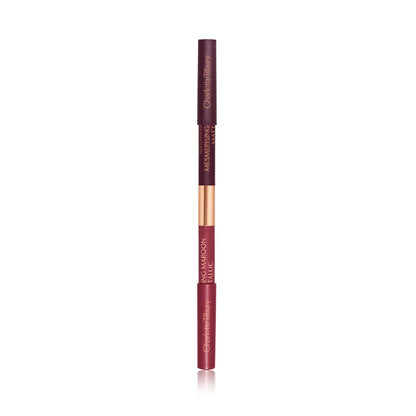 closed-up, double-sided eyeliner pen with half the outside a bright maroon and the other half a rich violet.