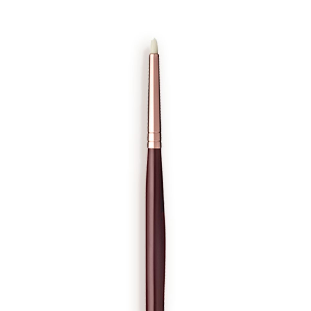 Close-up of an eyeliner brush with white-coloured brsitles with a rose-gold and dark crimson handle.