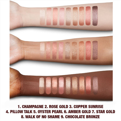 Fair, light, tan, and deep-tone arms with swatches of extremely pigmented cream eyeshadows with a metallic finish in shades of pink, gold, brown, peach, silver, purple, and bronze.