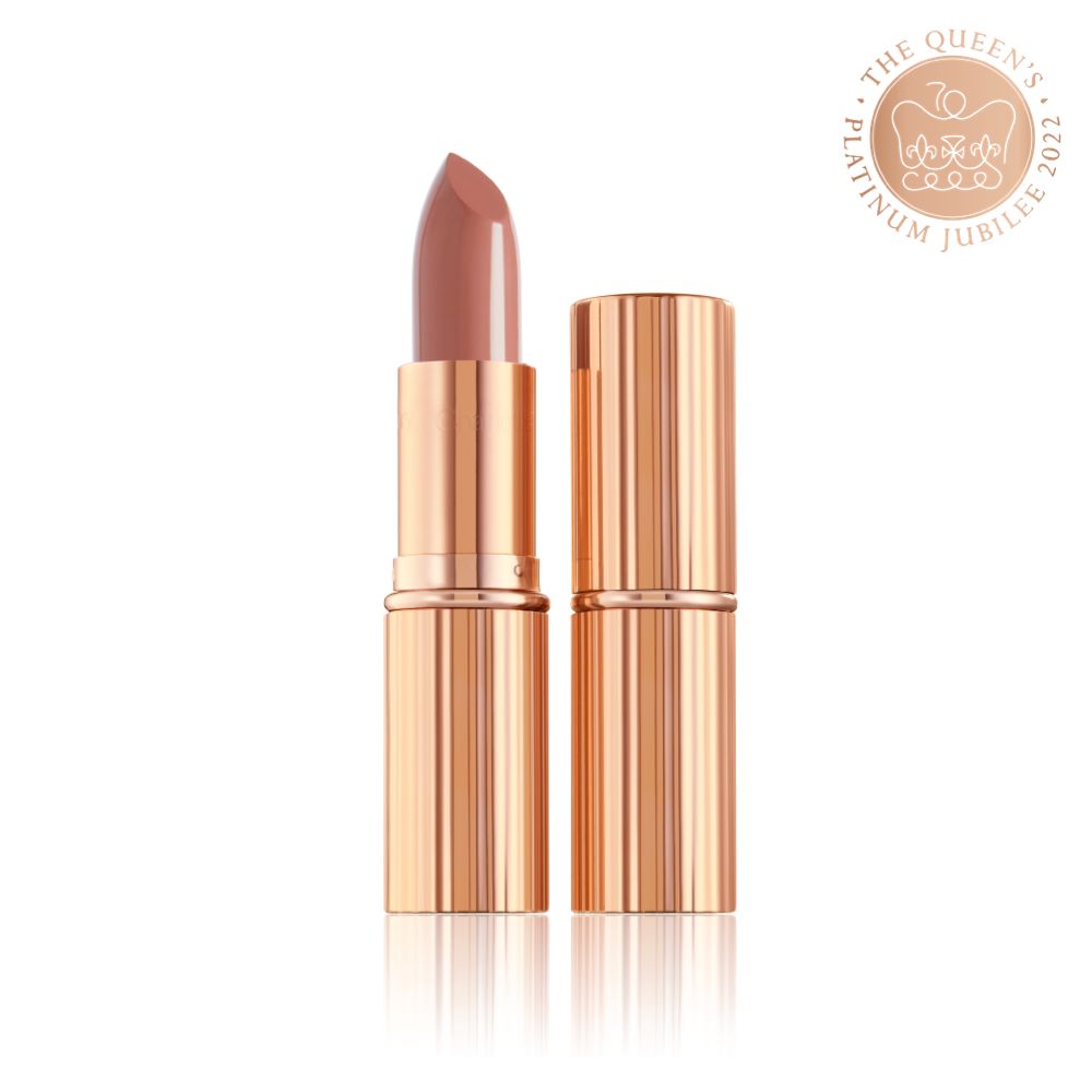 two lipsticks, with and without lid, in soft rosy peach shade with a satin finish in sleek gold-coloured packaging.