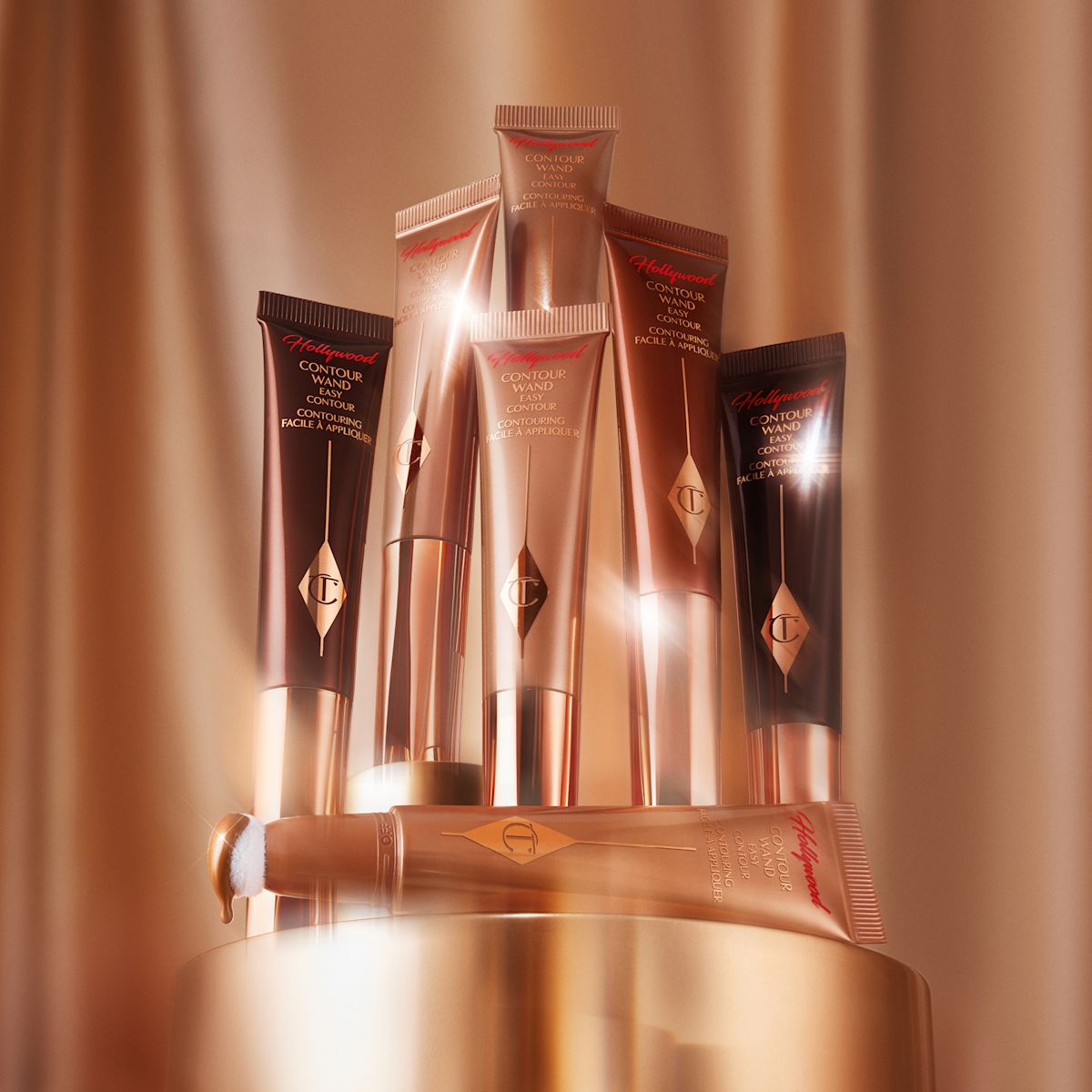 Hollywood Contour Wand Easy Liquid Contour against gold curtain