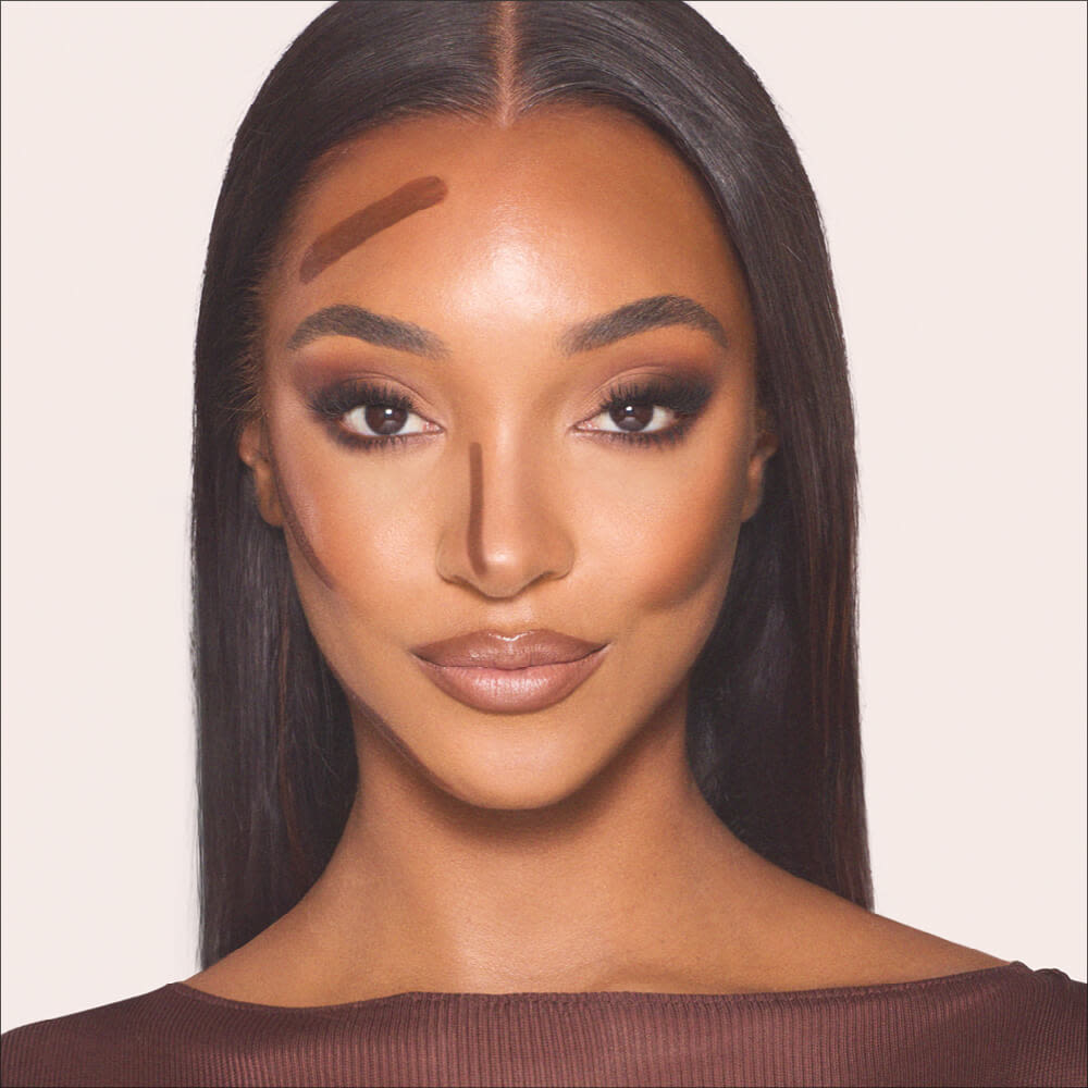 Model with contour lines on face.