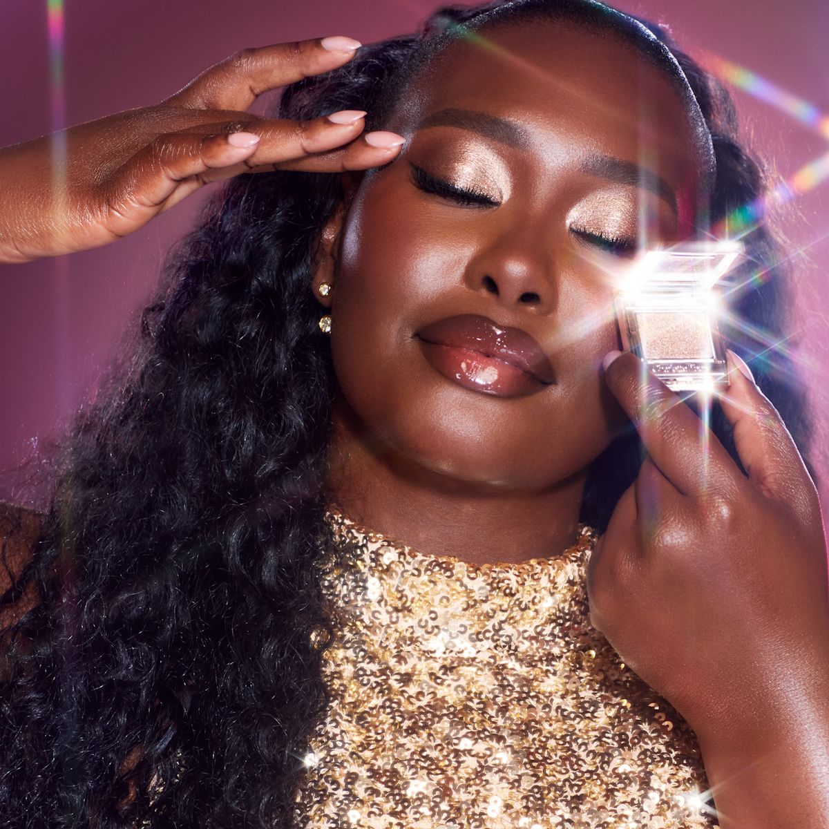 Model wearing Charlotte's Hypnotising Pop Shot in Diamond Eyes