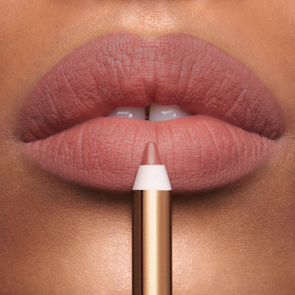 Icon Baby Lip Cheat on medium skin tone model