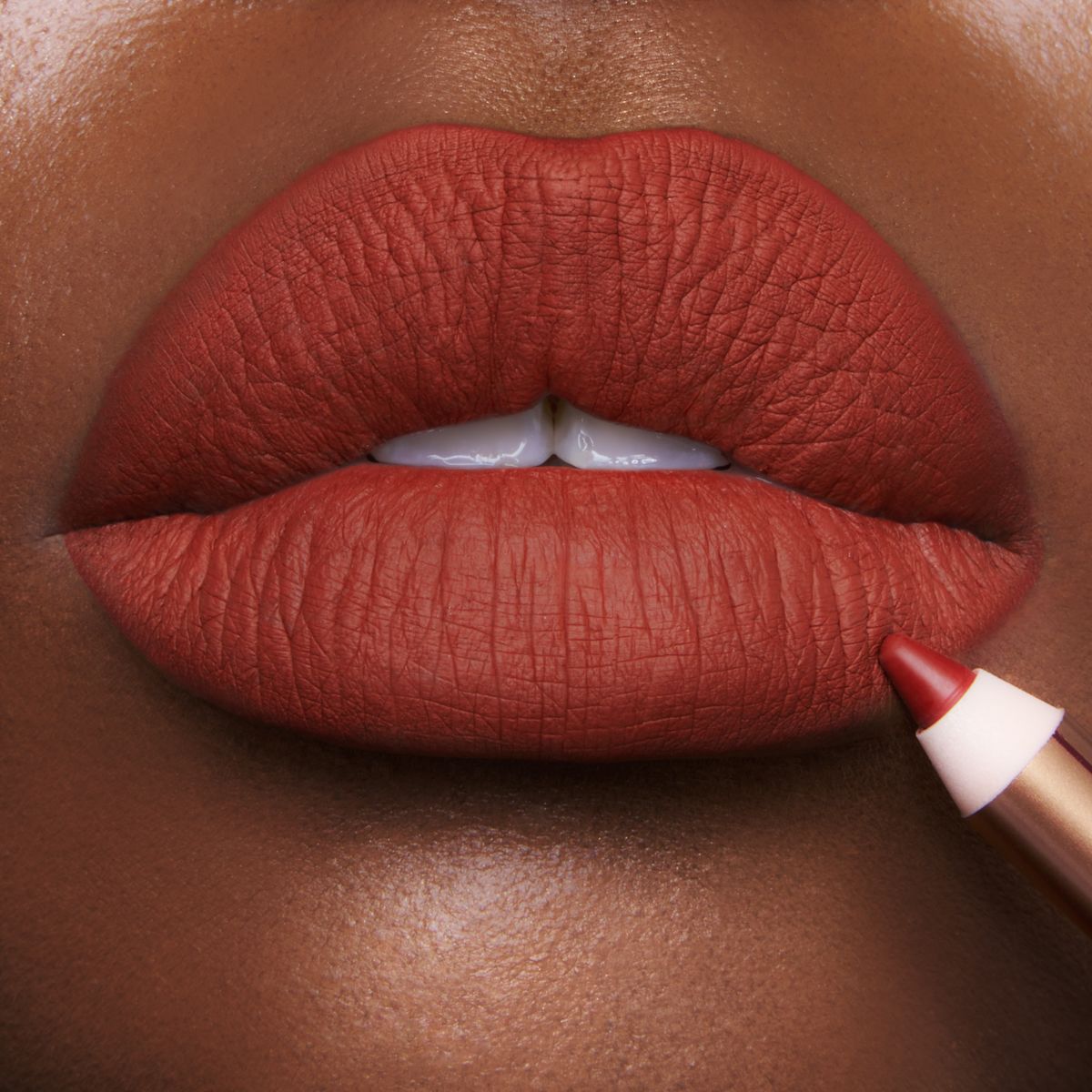 Mark of a Kiss on deep skin tone model