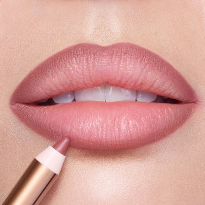 Lip Cheat Pillow Talk Medium Lip Liner on a close up of lips