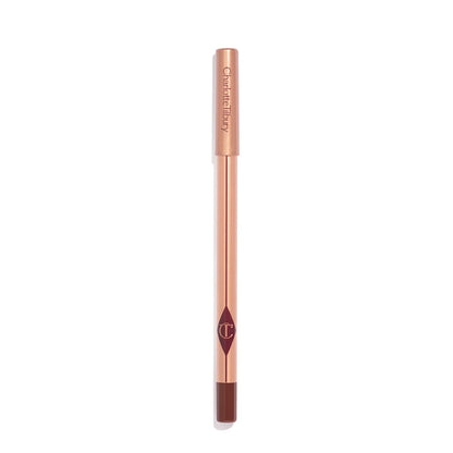 A dark red-brown lip liner pencil with a golden-coloured body with nude-pink box packaging.