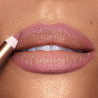 Lip Cheat Pillow Talk Medium Lip Liner on a close up of lips