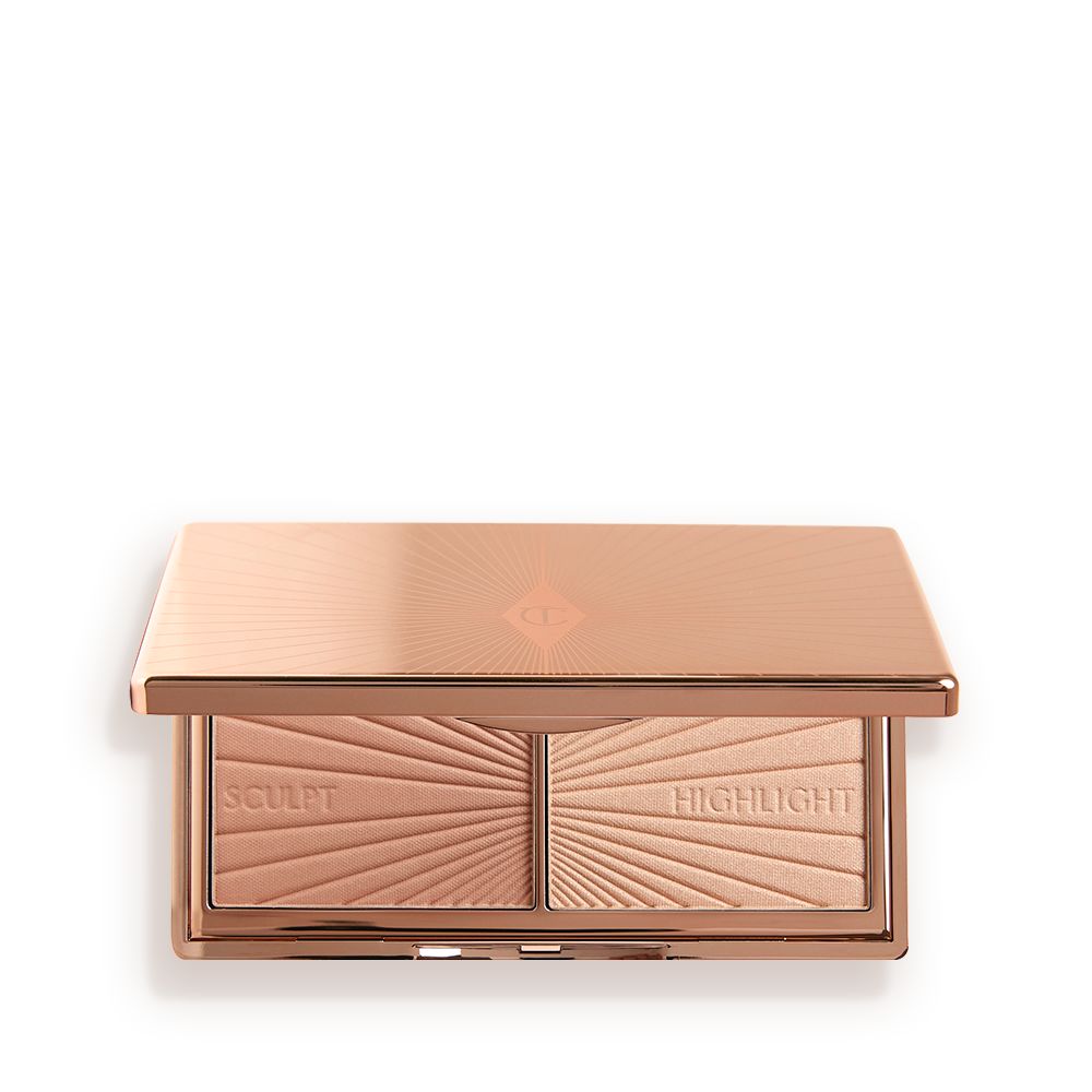 An open, mirrored-lid duo contour palette for light to medium skin tones in sleek rose-gold-coloured packaging.