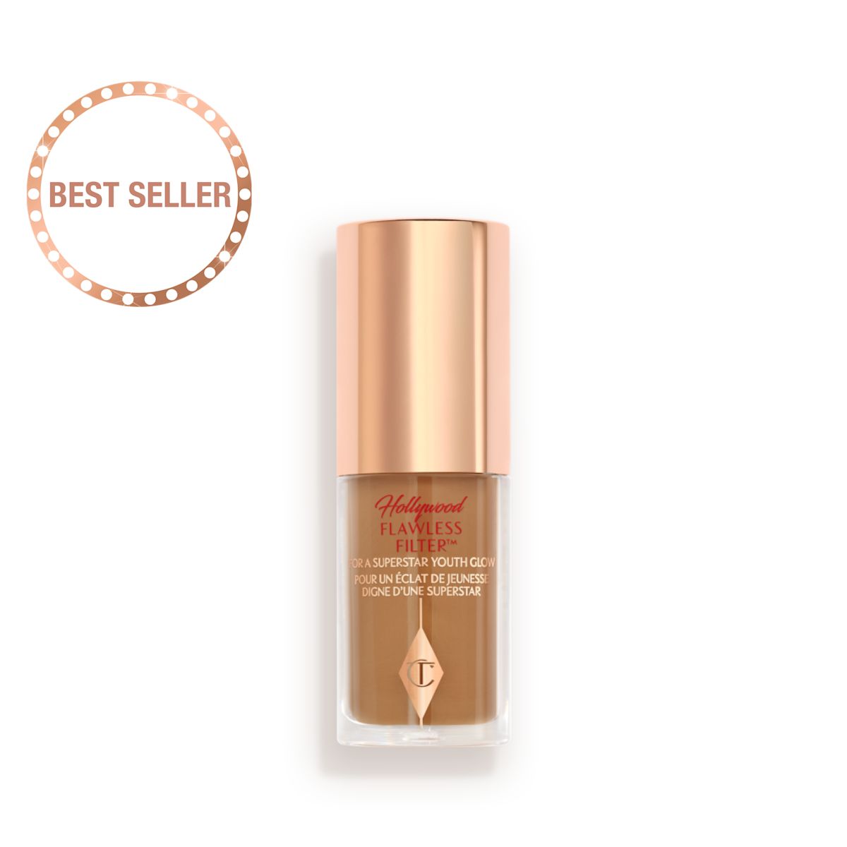 A mini luminous primer in a medium-dark shade in a glass bottle with a gold-coloured lid.