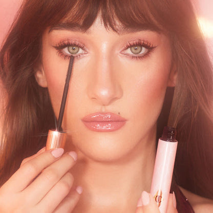 Bella Tilbury applying Pillow Talk Push Up mascara