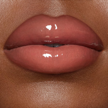Pillow Talk Big Lip Plumpgasm - Fair/Medium on deep skin tone model