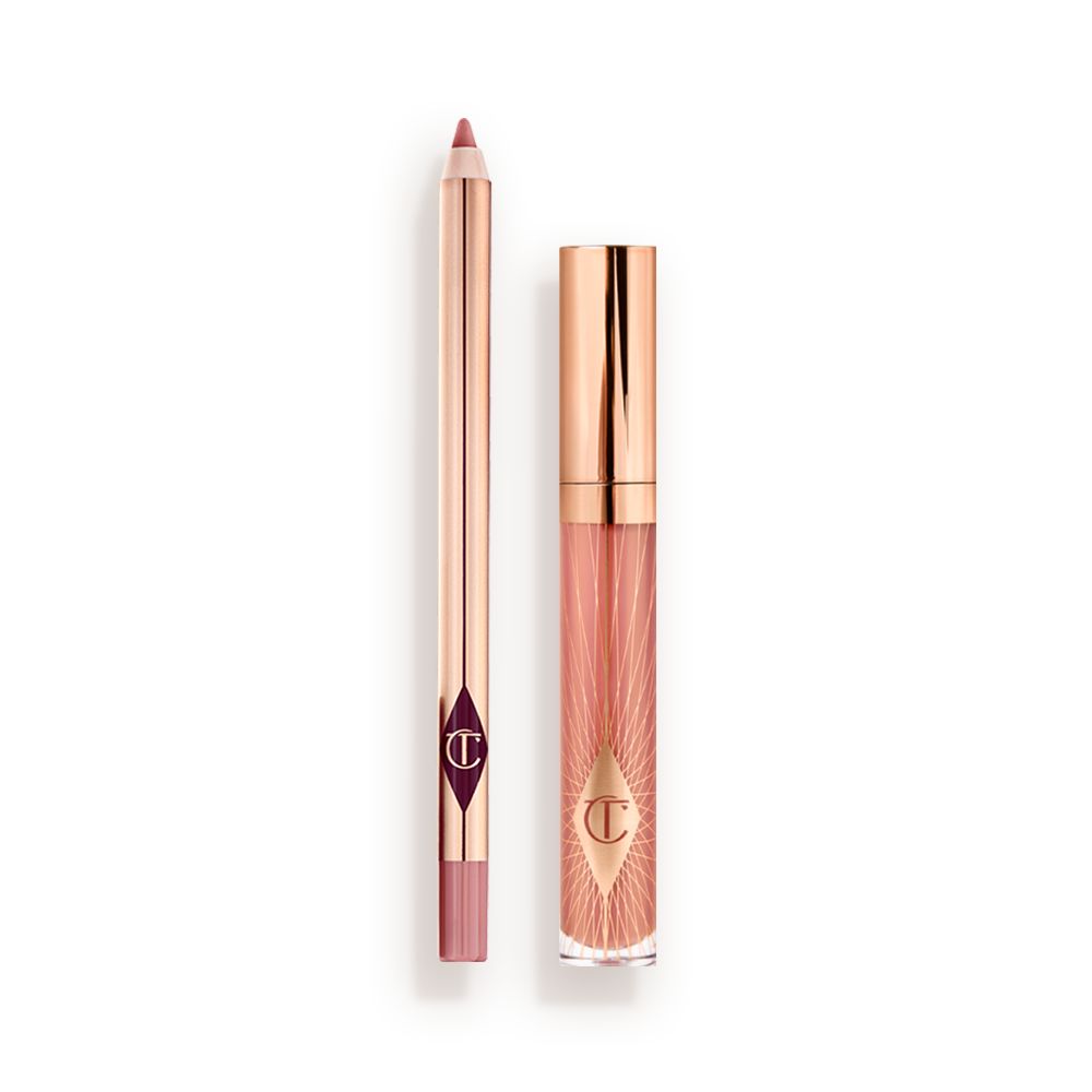 A closed, nude-pink lip gloss with a rose gold lid with an open, nude-pink lip liner pencil with a rose gold body.